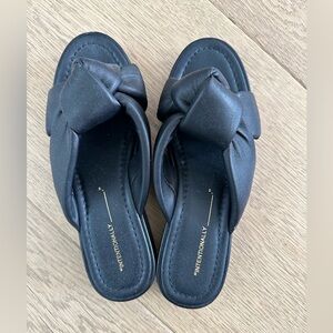 Intentionally Blank puffy leather slides